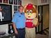 Fire Fighter M. Brown poses with Shoney Bear while turning in MDA money during the MDA Telethon.